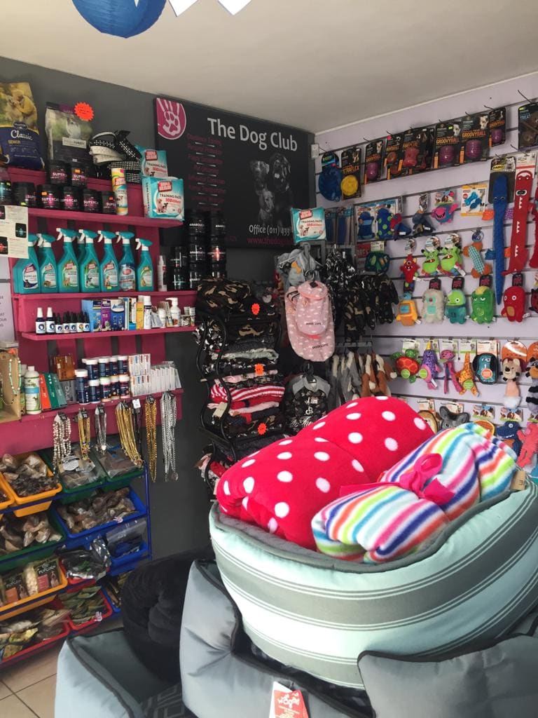 Well-stocked shelves inside The Dog Club shop