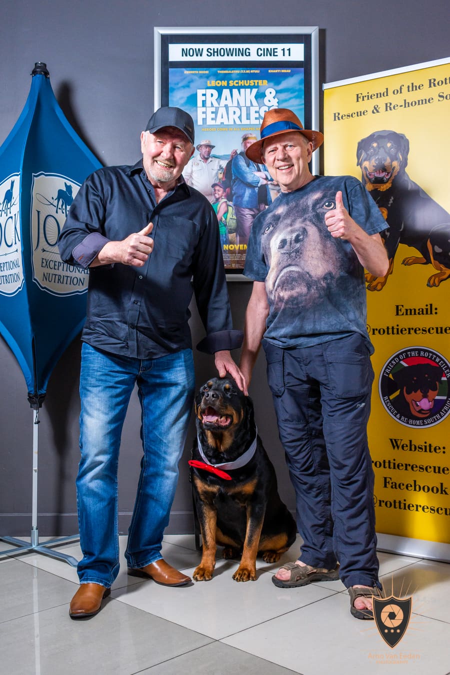 Adam the Rottweiler with Leon Schuster and Gray Hofmeyr at a Frank & Fearless event